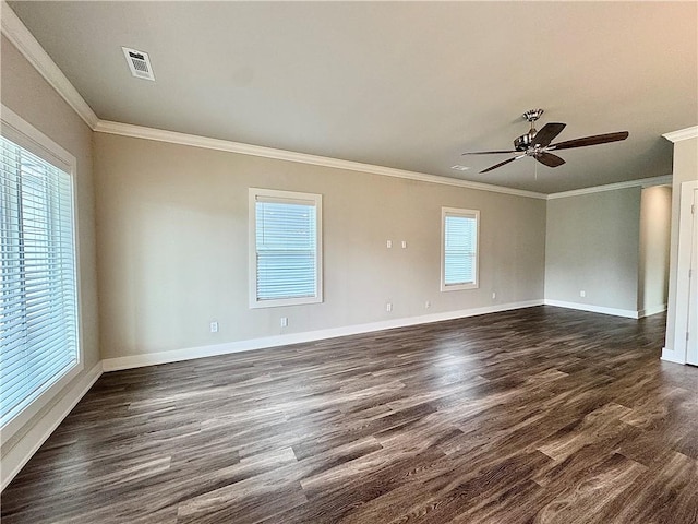 837 NE Heights Ln, Bentonville, AR 72712 - unfurnished room with healthy amount of natural light, crown molding, dark wood-style floors, and baseboards