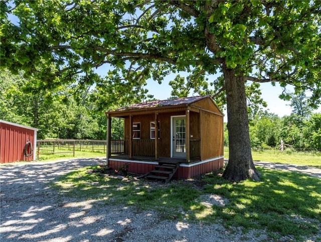 15071 Crossover Rd, Gravette, AR 72736 - view of outdoor structure with gravel driveway