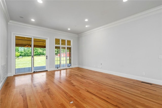 15071 Crossover Rd, Gravette, AR 72736 - empty room with crown molding, baseboards, recessed lighting, and light wood-style floors