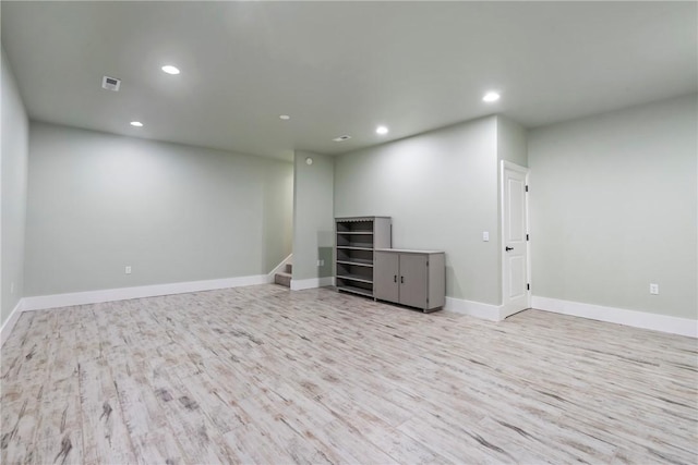 15071 Crossover Rd, Gravette, AR 72736 - basement featuring recessed lighting, wood finished floors, baseboards, and stairs