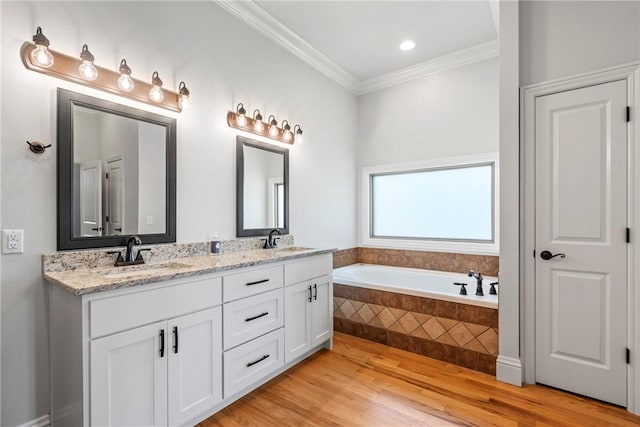 15071 Crossover Rd, Gravette, AR 72736 - full bath featuring double vanity, crown molding, wood finished floors, and a bath