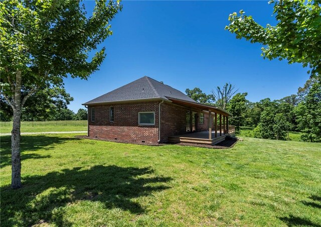 15071 Crossover Rd, Gravette, AR 72736 - view of side of property with brick siding, crawl space, and a lawn