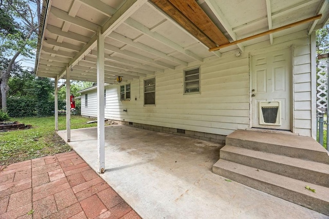 713 Young St, Springdale, AR 72764 - view of patio with an attached carport