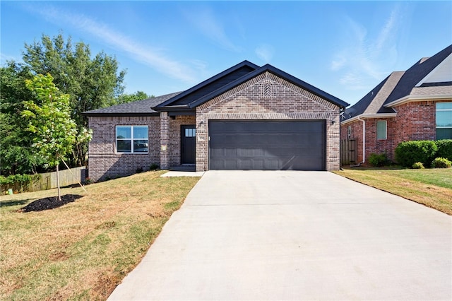 4545 Gibson St, Springdale, AR 72762 - ranch-style home featuring brick siding, a garage, and driveway