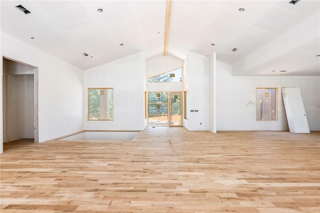 15903 Hawks Landing Dr, Rogers, AR 72756 - unfurnished living room featuring wood finished floors, high vaulted ceiling, and beam ceiling