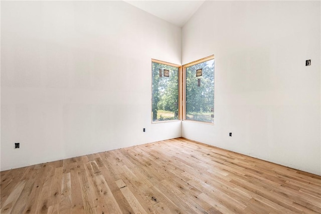 15903 Hawks Landing Dr, Rogers, AR 72756 - spare room with wood finished floors and a towering ceiling