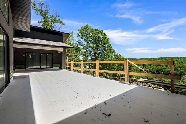 15903 Hawks Landing Dr, Rogers, AR 72756 - wooden deck with a patio area and driveway