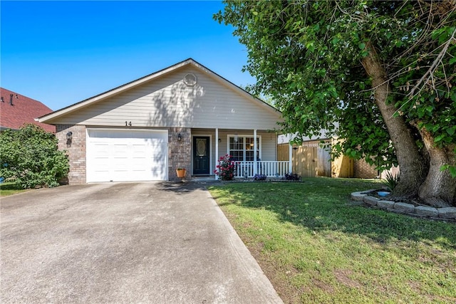 14 Jordan Ln, Bentonville, AR 72712 - single story home with a porch, a garage, driveway, and brick siding