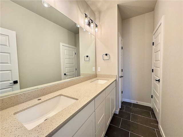 6002 SW Desert Ave, Bentonville, AR 72713 - bathroom with double vanity and tile patterned flooring