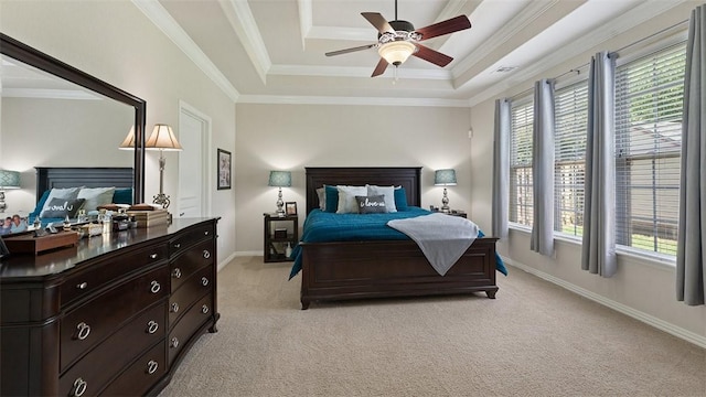 1051 Thornridge Rd, Bentonville, AR 72713 - bedroom with multiple windows, light colored carpet, a tray ceiling, baseboards, and ornamental molding