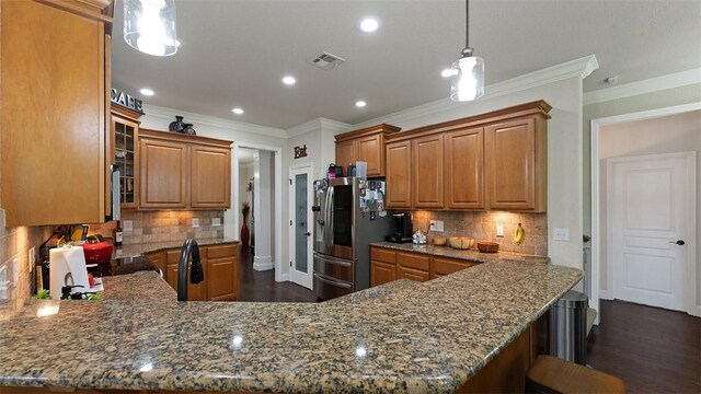 1051 Thornridge Rd, Bentonville, AR 72713 - kitchen featuring stainless steel fridge, brown cabinets, backsplash, recessed lighting, and crown molding