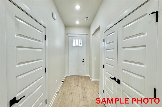 5902 SW Desert Ave, Bentonville, AR 72713 - doorway featuring light wood-style flooring, baseboards, and recessed lighting