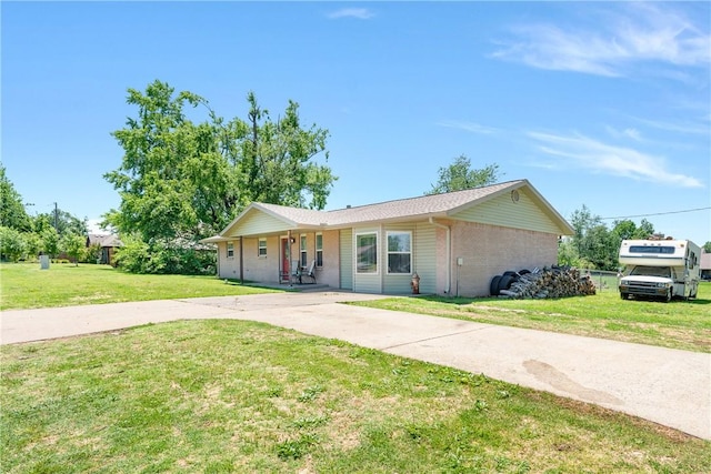 1630 S Dixieland Rd, Rogers, AR 72758 - single story home with a front yard, brick siding, and covered porch