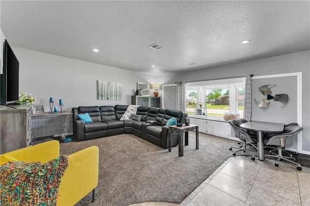 1630 S Dixieland Rd, Rogers, AR 72758 - living room with recessed lighting, light carpet, light tile patterned flooring, and a textured ceiling