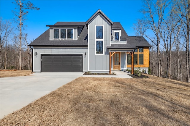 10 Rushden Ln, Bella Vista, AR 72714 - modern farmhouse featuring concrete driveway, roof with shingles, a garage, board and batten siding, and a porch