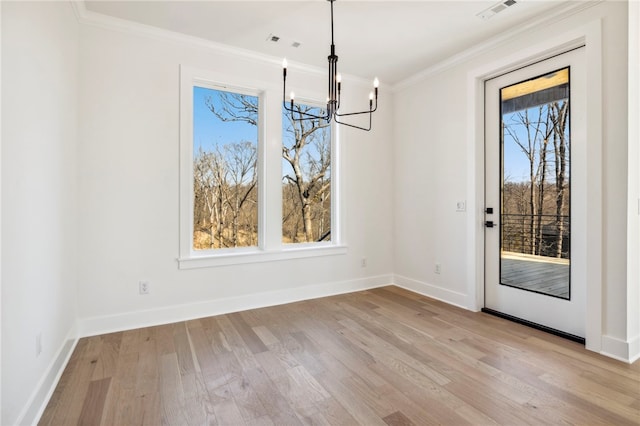 10 Rushden Ln, Bella Vista, AR 72714 - unfurnished dining area with a chandelier, baseboards, light wood finished floors, and ornamental molding