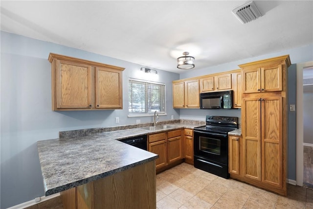 907 S Ithaca Ave, Russellville, AR 72801 - kitchen featuring black appliances, a sink, a peninsula, and dark countertops