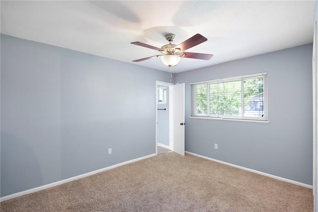 907 S Ithaca Ave, Russellville, AR 72801 - unfurnished room with a ceiling fan, carpet, and baseboards