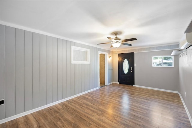 907 S Ithaca Ave, Russellville, AR 72801 - entrance foyer with baseboards, wood finished floors, a ceiling fan, and crown molding