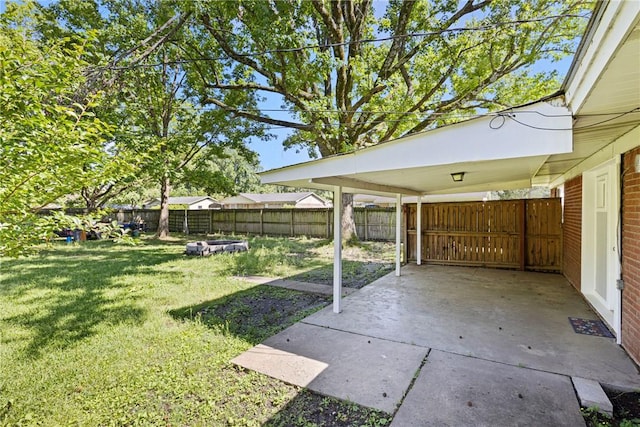 907 S Ithaca Ave, Russellville, AR 72801 - view of yard featuring a carport