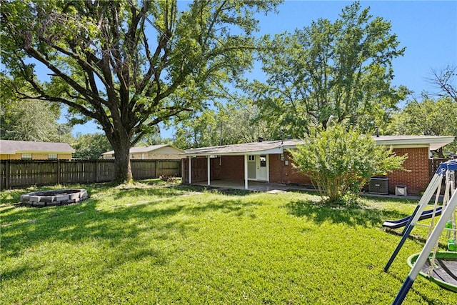 907 S Ithaca Ave, Russellville, AR 72801 - view of yard with an outdoor fire pit