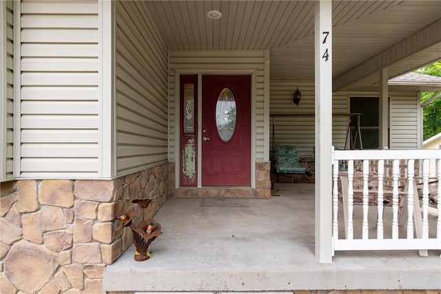 74 Twin Peak Dr, Holiday Island, AR 72631 - property entrance with a porch and stone siding