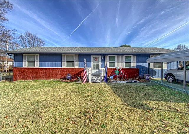 103 Mockingbird St, Harrison, AR 72601 - ranch-style house with brick siding, a front yard, and a detached carport