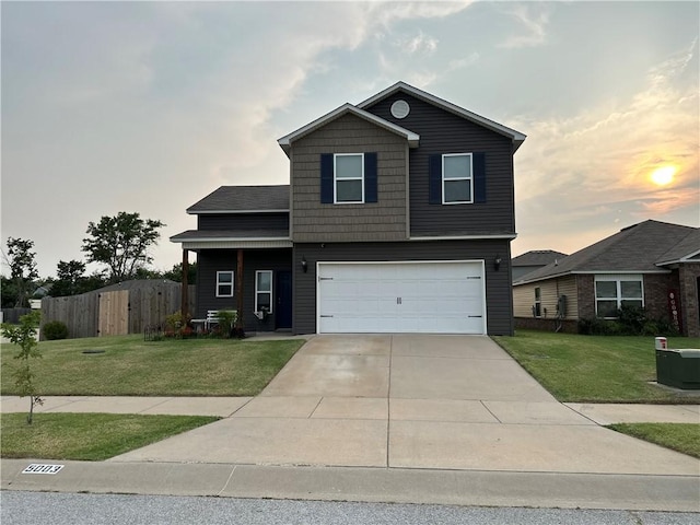 5003 W Claxton Cir, Fayetteville, AR 72704 - view of front of property with a garage and driveway