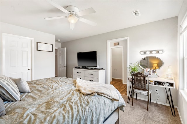 5003 W Claxton Cir, Fayetteville, AR 72704 - bedroom with carpet flooring, a ceiling fan, and baseboards