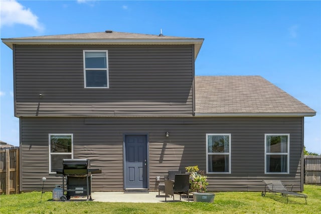 5003 W Claxton Cir, Fayetteville, AR 72704 - back of house with a patio area and roof with shingles