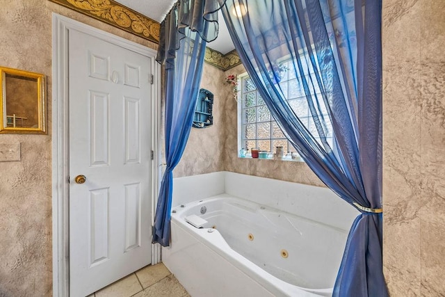 2977 Quartz Dr, Fayetteville, AR 72704 - full bathroom with a whirlpool tub and tile patterned floors