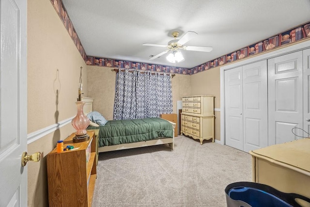2977 Quartz Dr, Fayetteville, AR 72704 - bedroom featuring carpet flooring, a closet, and a ceiling fan