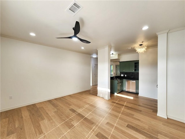 1115 N Leverett Ave Unit 102, Fayetteville, AR 72703 - unfurnished living room with a ceiling fan, crown molding, recessed lighting, light wood-style floors, and a sink