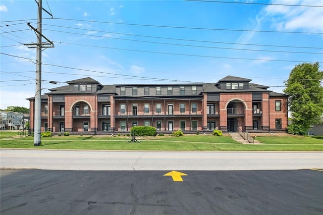 1115 N Leverett Ave Unit 102, Fayetteville, AR 72703 - townhome / multi-family property featuring a front lawn