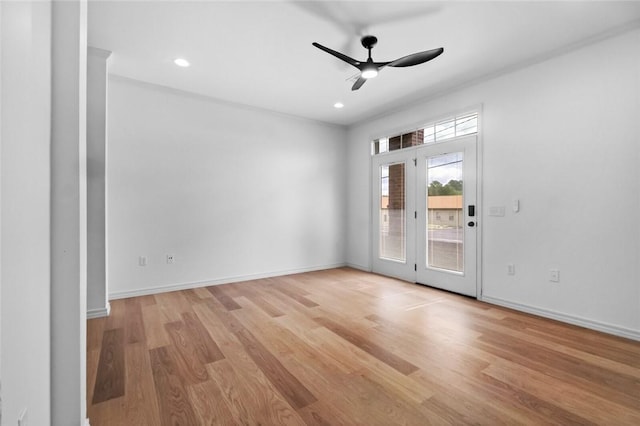 1115 N Leverett Ave Unit 102, Fayetteville, AR 72703 - empty room with ceiling fan, light wood-type flooring, baseboards, and recessed lighting