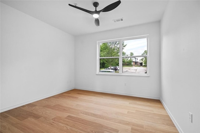 1115 N Leverett Ave Unit 102, Fayetteville, AR 72703 - spare room with ceiling fan, light wood-type flooring, and baseboards