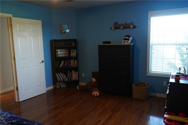 2655 S Elmira Ave, Russellville, AR 72802 - bedroom with wood finished floors, multiple windows, and baseboards