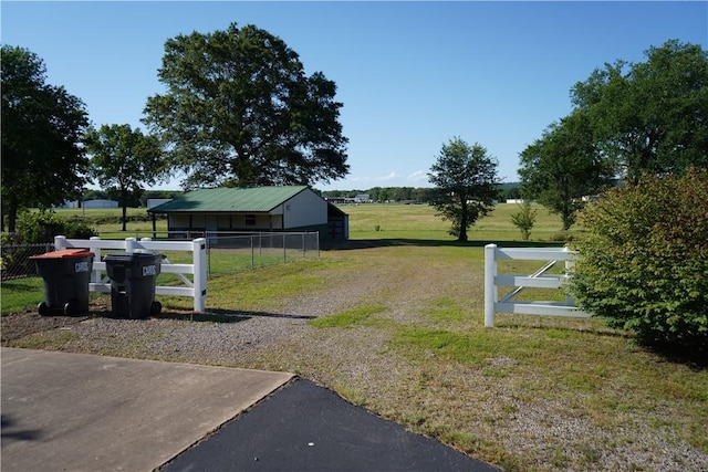 2655 S Elmira Ave, Russellville, AR 72802 - view of yard featuring a pole building, an outbuilding, and a view of rural / pastoral area