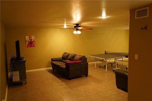 2655 S Elmira Ave, Russellville, AR 72802 - recreation room with ceiling fan, baseboards, and a textured ceiling