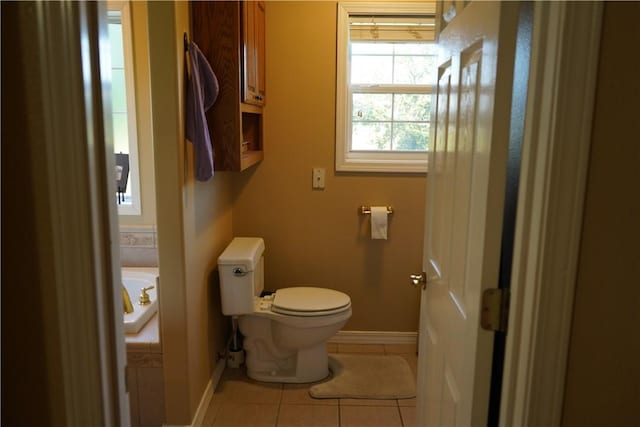 2655 S Elmira Ave, Russellville, AR 72802 - bathroom featuring toilet, tile patterned floors, and baseboards