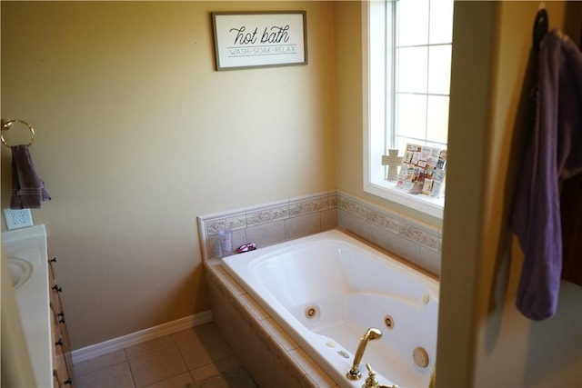 2655 S Elmira Ave, Russellville, AR 72802 - bathroom featuring a tub with jets, vanity, tile patterned floors, and baseboards