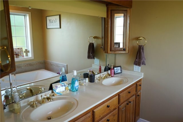2655 S Elmira Ave, Russellville, AR 72802 - full bathroom featuring plenty of natural light, double vanity, and a garden tub