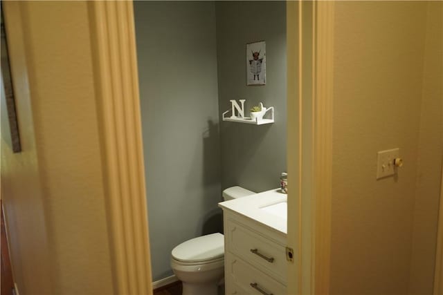 2655 S Elmira Ave, Russellville, AR 72802 - bathroom featuring vanity and toilet