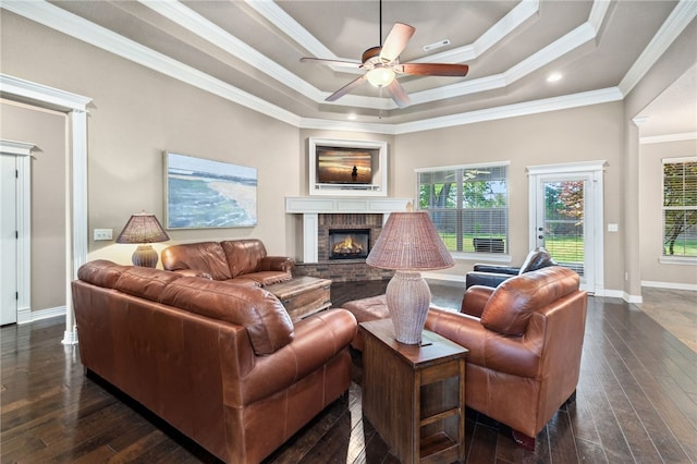 1651 Quail Ridge Way, Bentonville, AR 72713 - living area featuring a raised ceiling, a ceiling fan, healthy amount of natural light, ornamental molding, and a fireplace