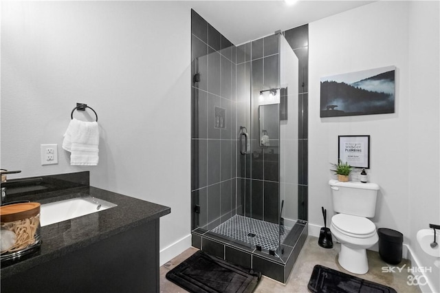 8775 Falls Hollow Rd, Rogers, AR 72756 - bathroom featuring toilet, a stall shower, vanity, and baseboards