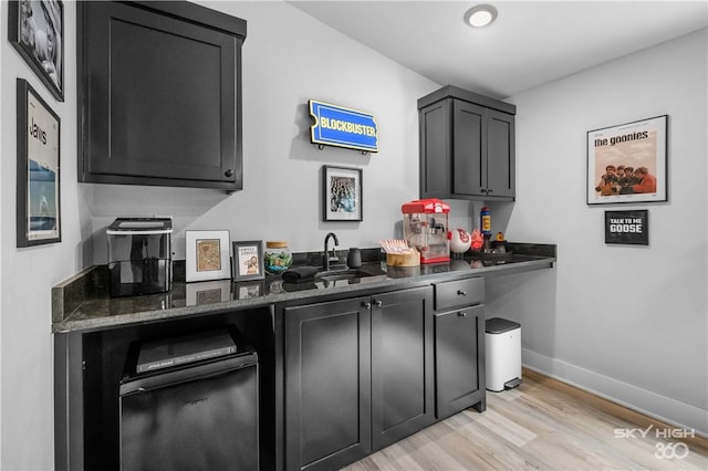8775 Falls Hollow Rd, Rogers, AR 72756 - indoor bar featuring baseboards and light wood finished floors