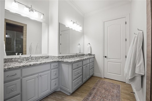 13 Dawn Hills Dr, Bentonville, AR 72712 - full bathroom featuring ornamental molding, double vanity, wood finished floors, and baseboards
