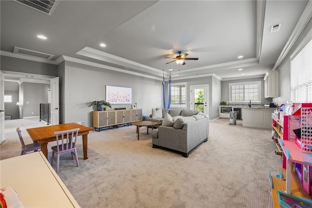 13 Dawn Hills Dr, Bentonville, AR 72712 - living area featuring light carpet, a raised ceiling, ornamental molding, ceiling fan, and recessed lighting