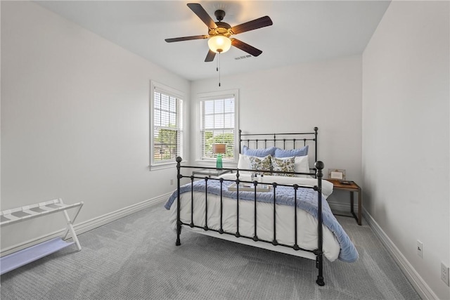 13 Dawn Hills Dr, Bentonville, AR 72712 - bedroom with carpet floors, baseboards, and ceiling fan