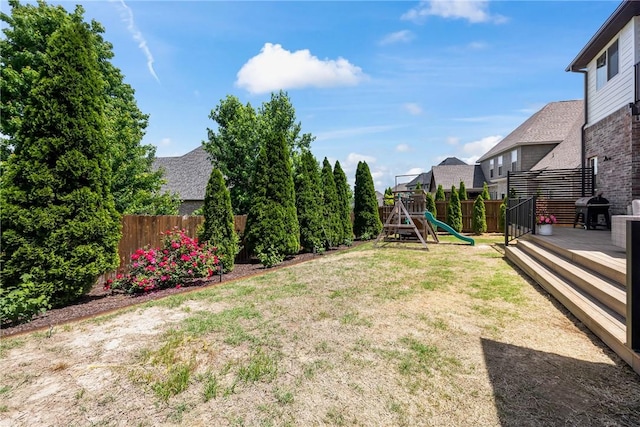 13 Dawn Hills Dr, Bentonville, AR 72712 - view of yard featuring a playground and a wooden deck